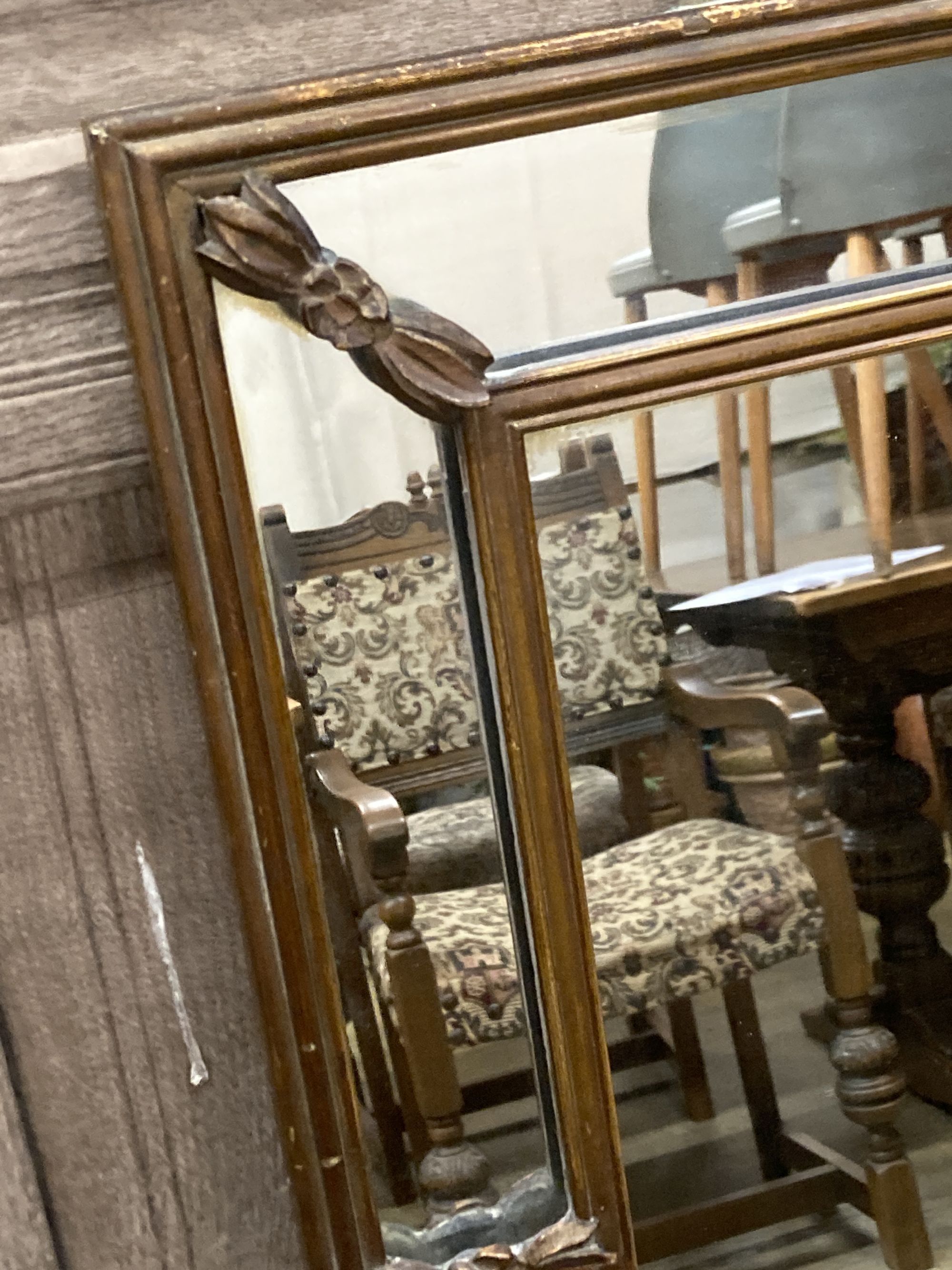 A Georgian style gilt-framed rectangular wall mirror with marginal plates, width 105cm, height 70cm